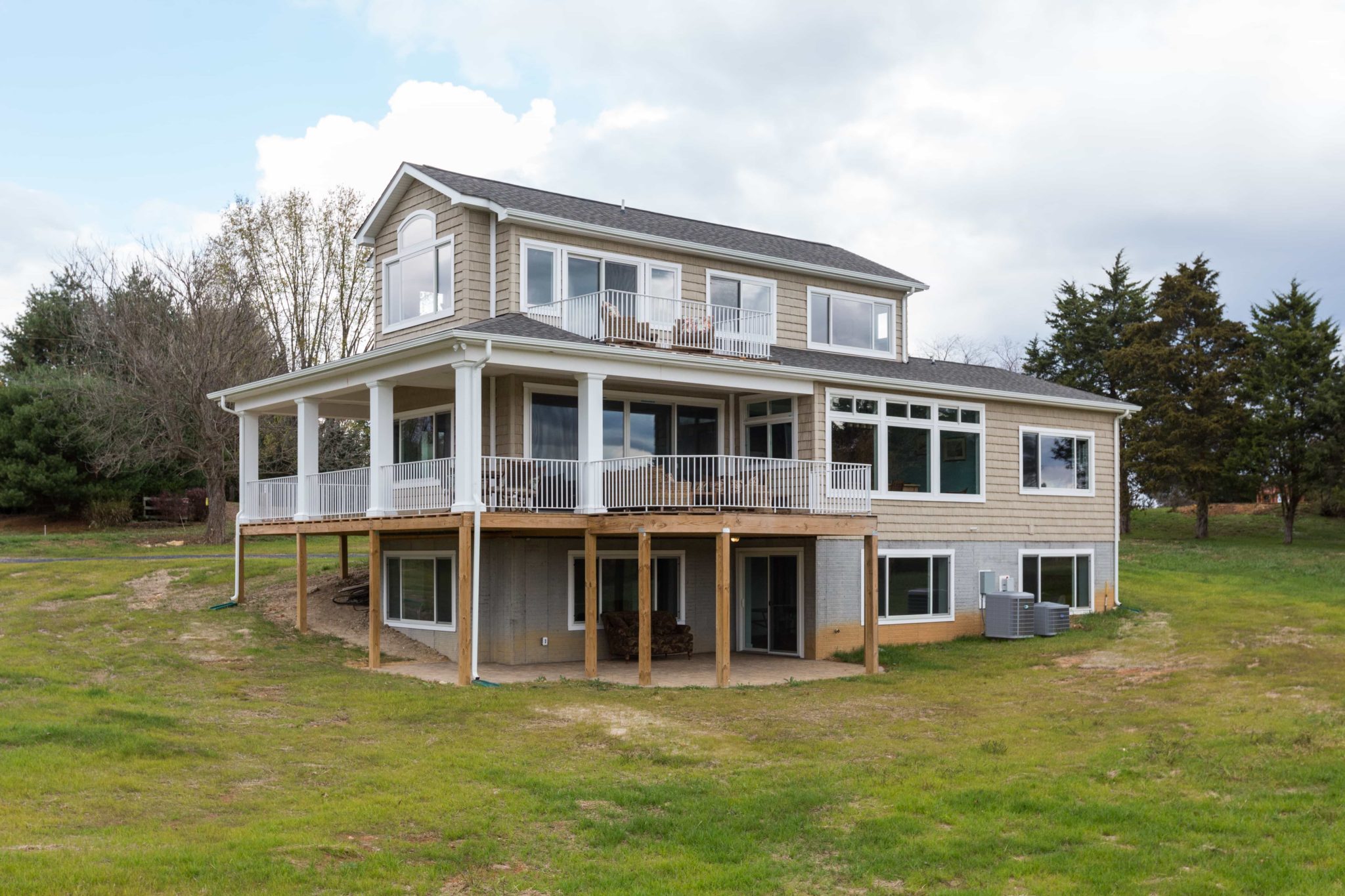 new house with wrap-around porch