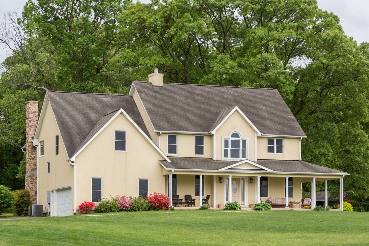 newly constructed house with mowed lawn